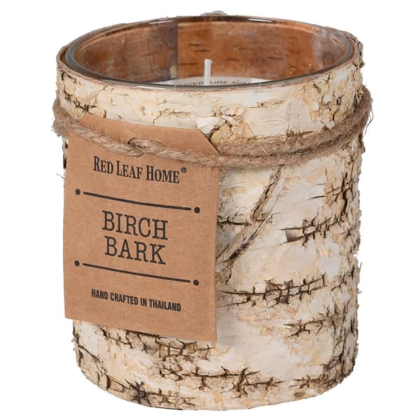 Birch bark covered glass candle part of the Studio Electric homeware range.